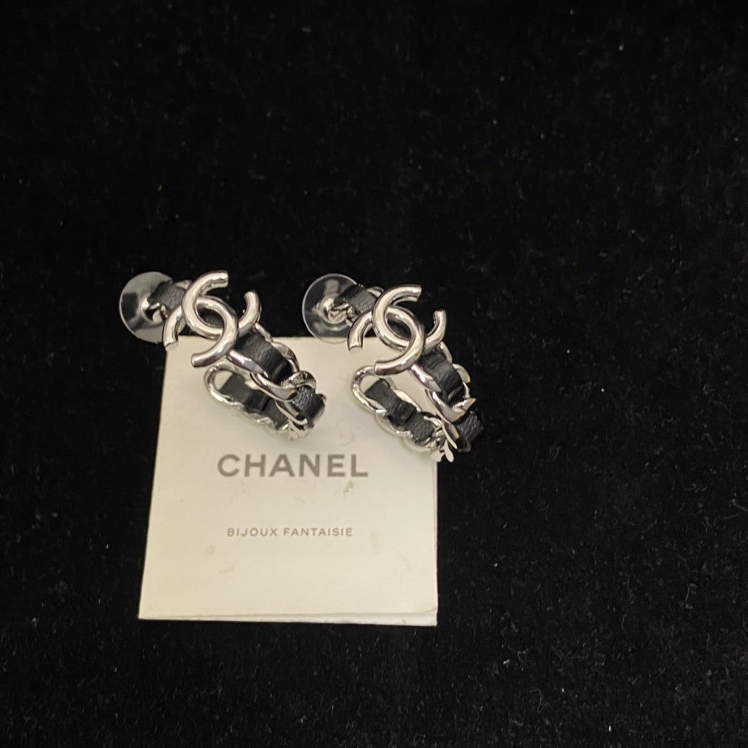 Chanel's  black hoop stud earrings