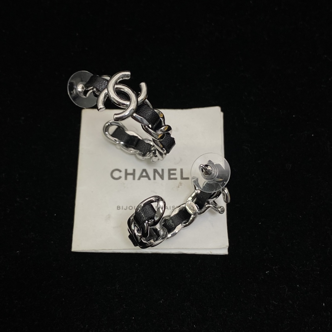 Chanel's  black hoop stud earrings