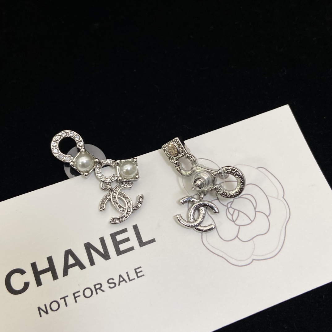 Chanel CoCo pearl double C stud earrings
