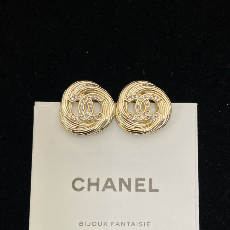 Chanel's new round brushed round stud earrings