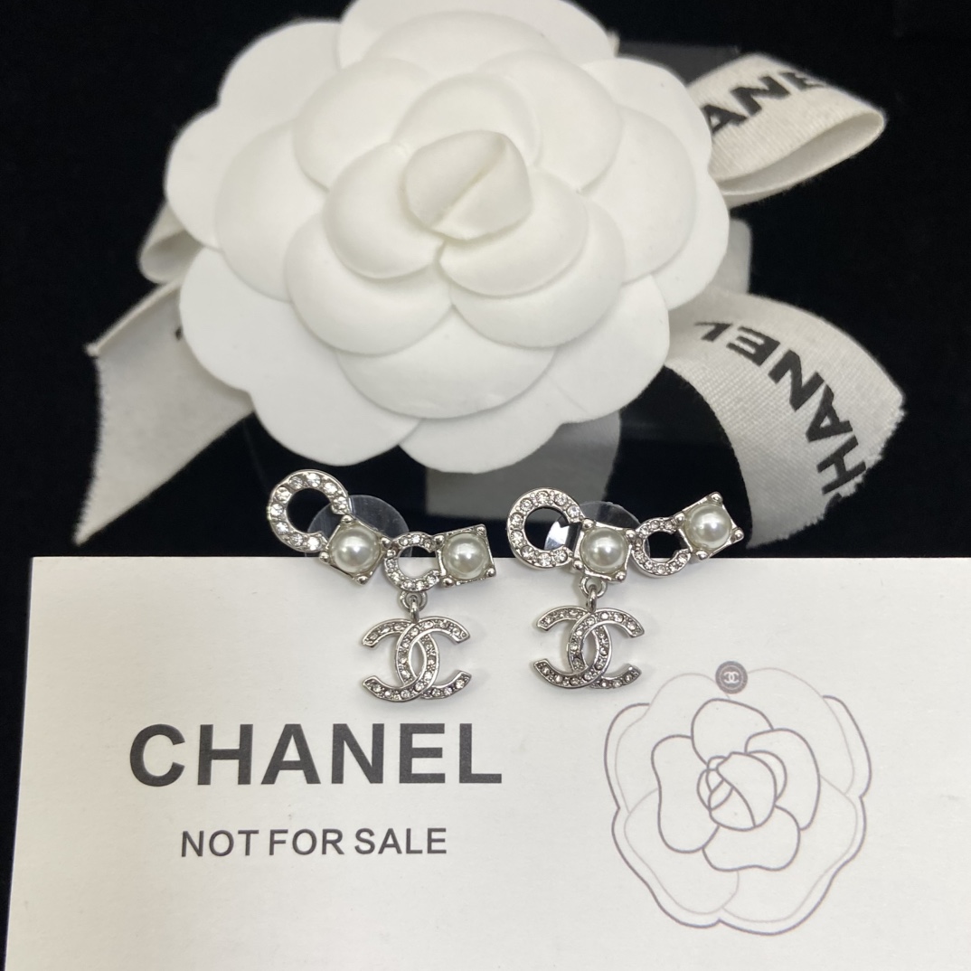Chanel CoCo pearl double C stud earrings