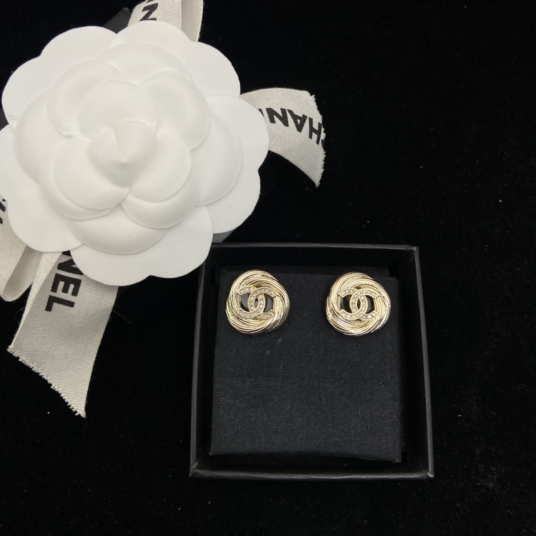 Chanel's new round brushed round stud earrings