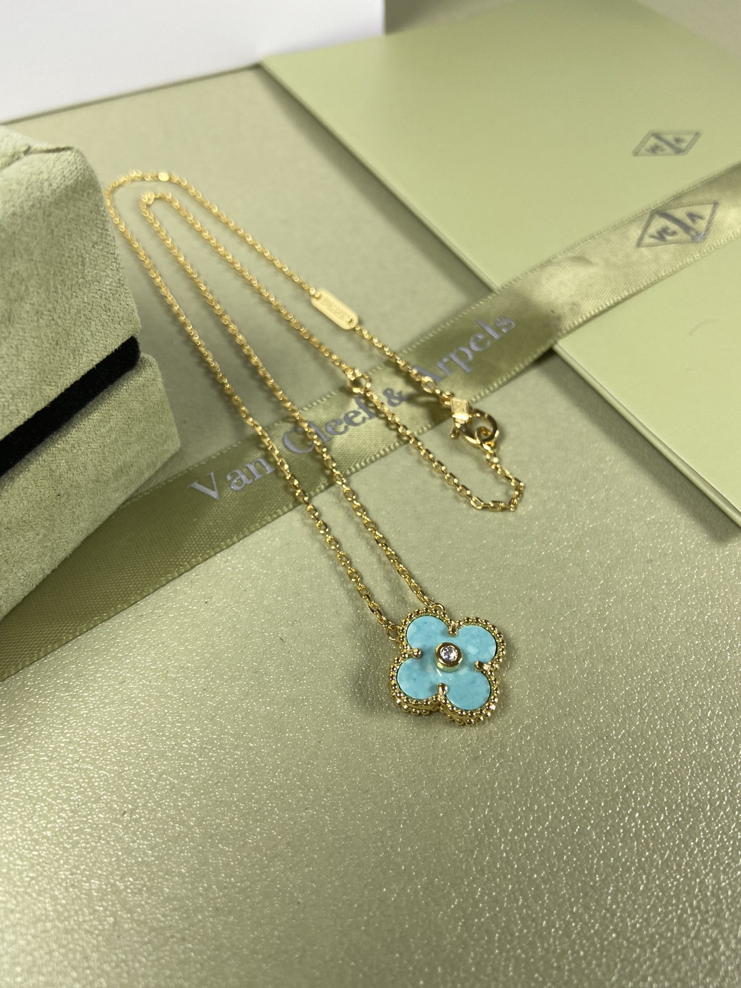 Van Cleef & Arpels mint blue four-leaf clover necklace