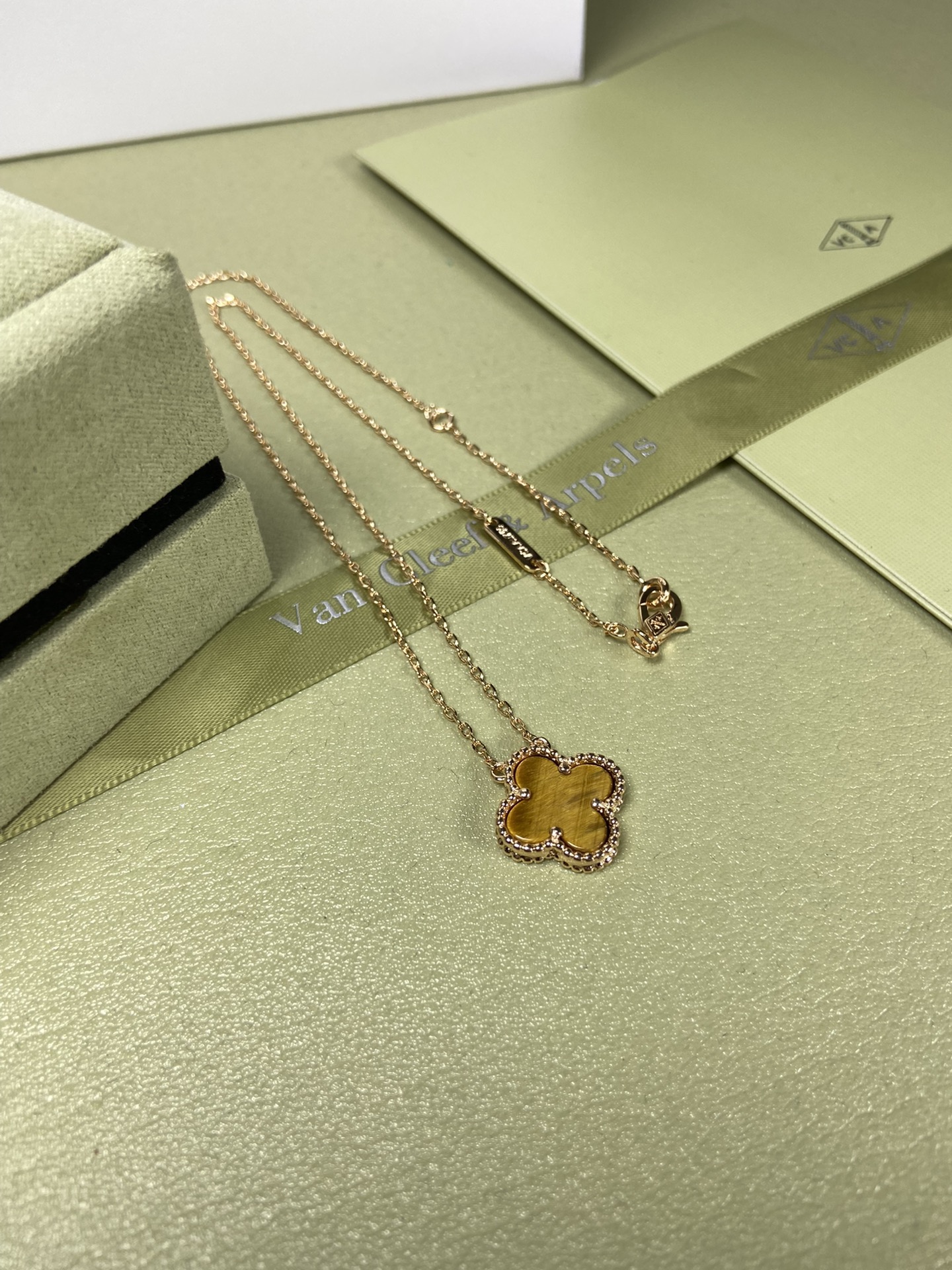Van Cleef & Arpels tiger's eye four-leaf clover necklace