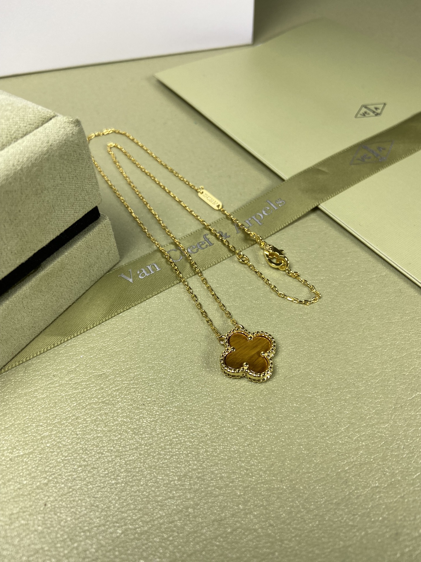 Van Cleef & Arpels tiger's eye four-leaf clover necklace