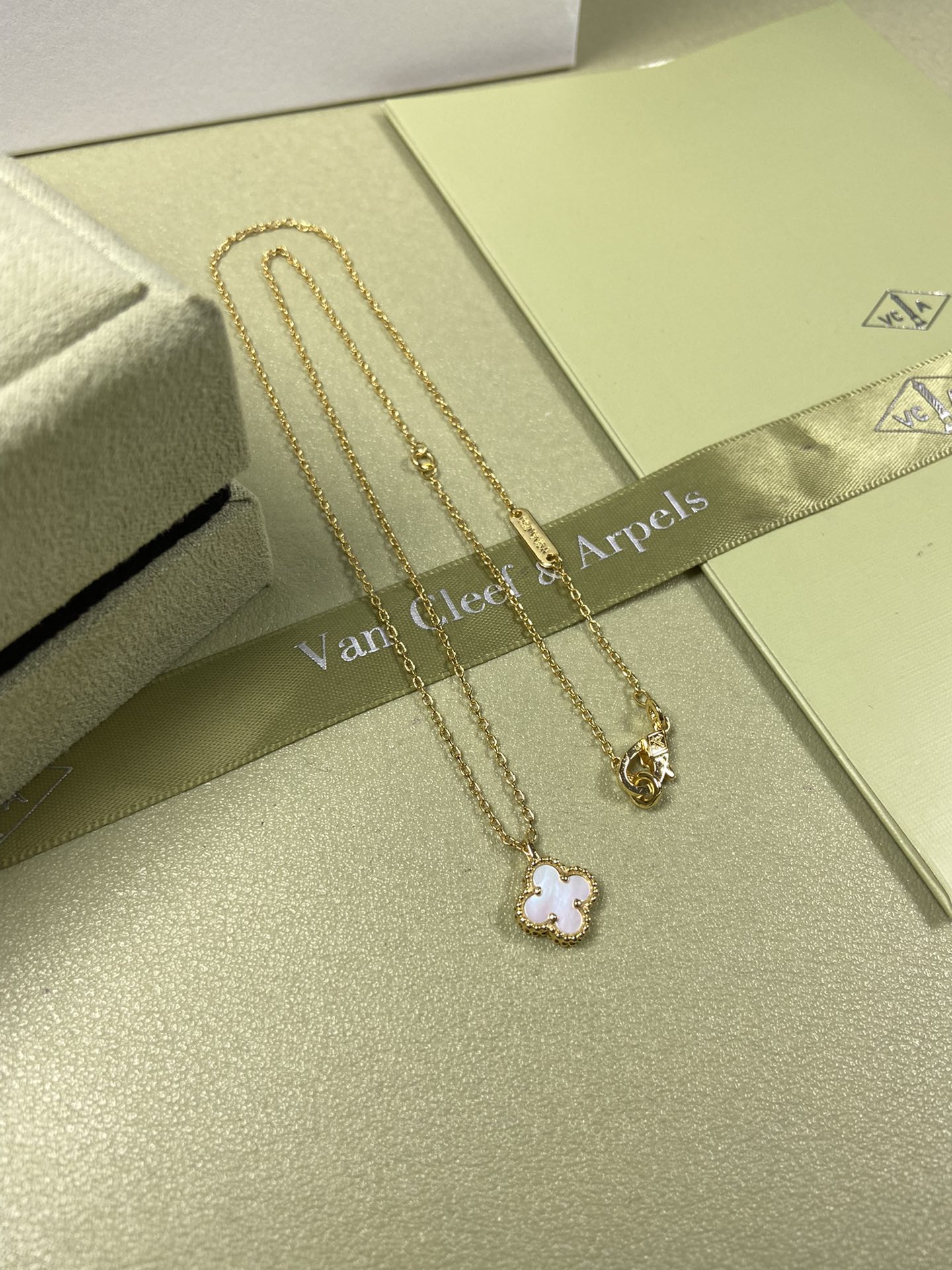 Van Cleef & Arpels mini white mother-of-pearl four-leaf clover necklace