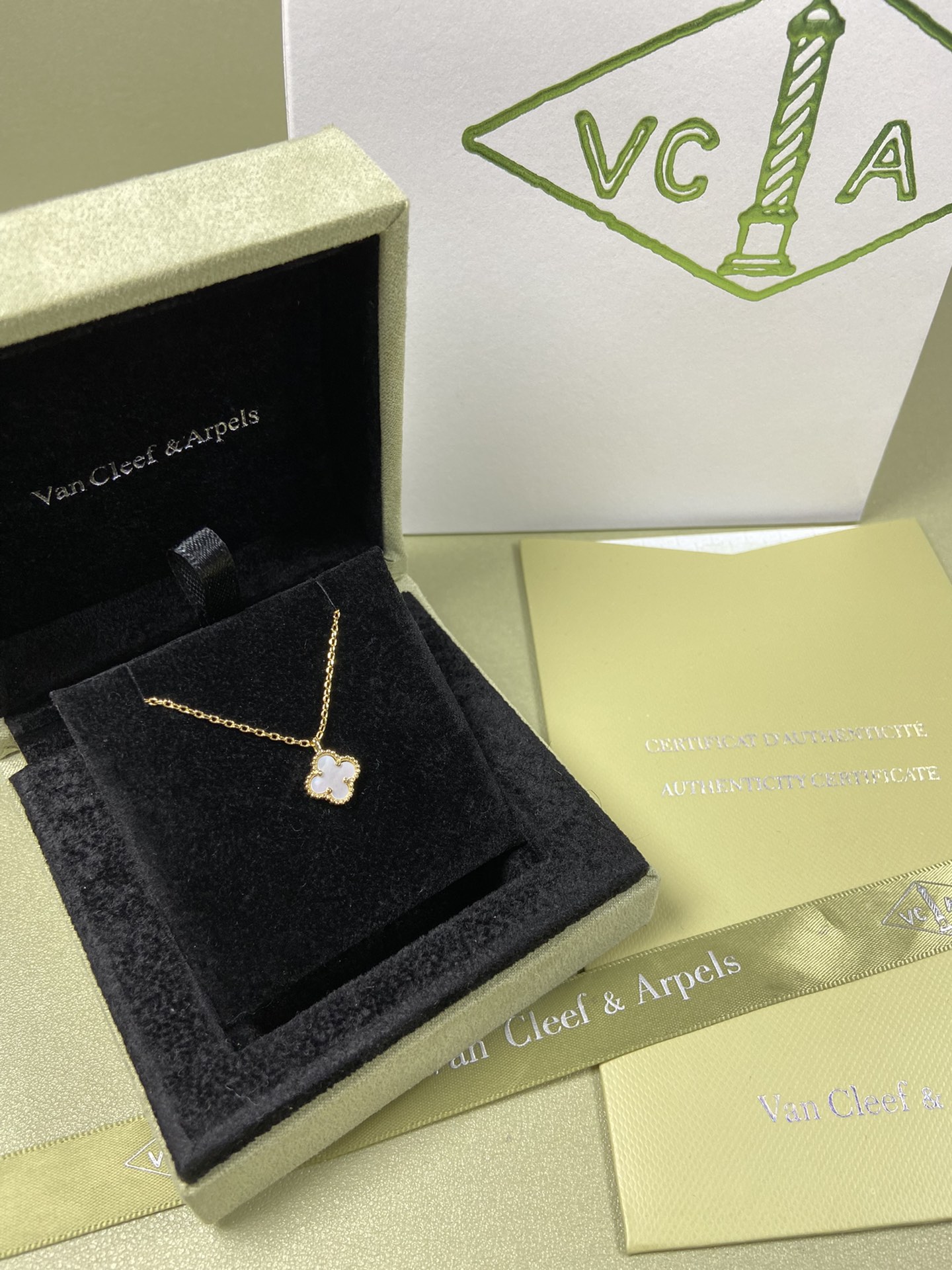 Van Cleef & Arpels mini white mother-of-pearl four-leaf clover necklace