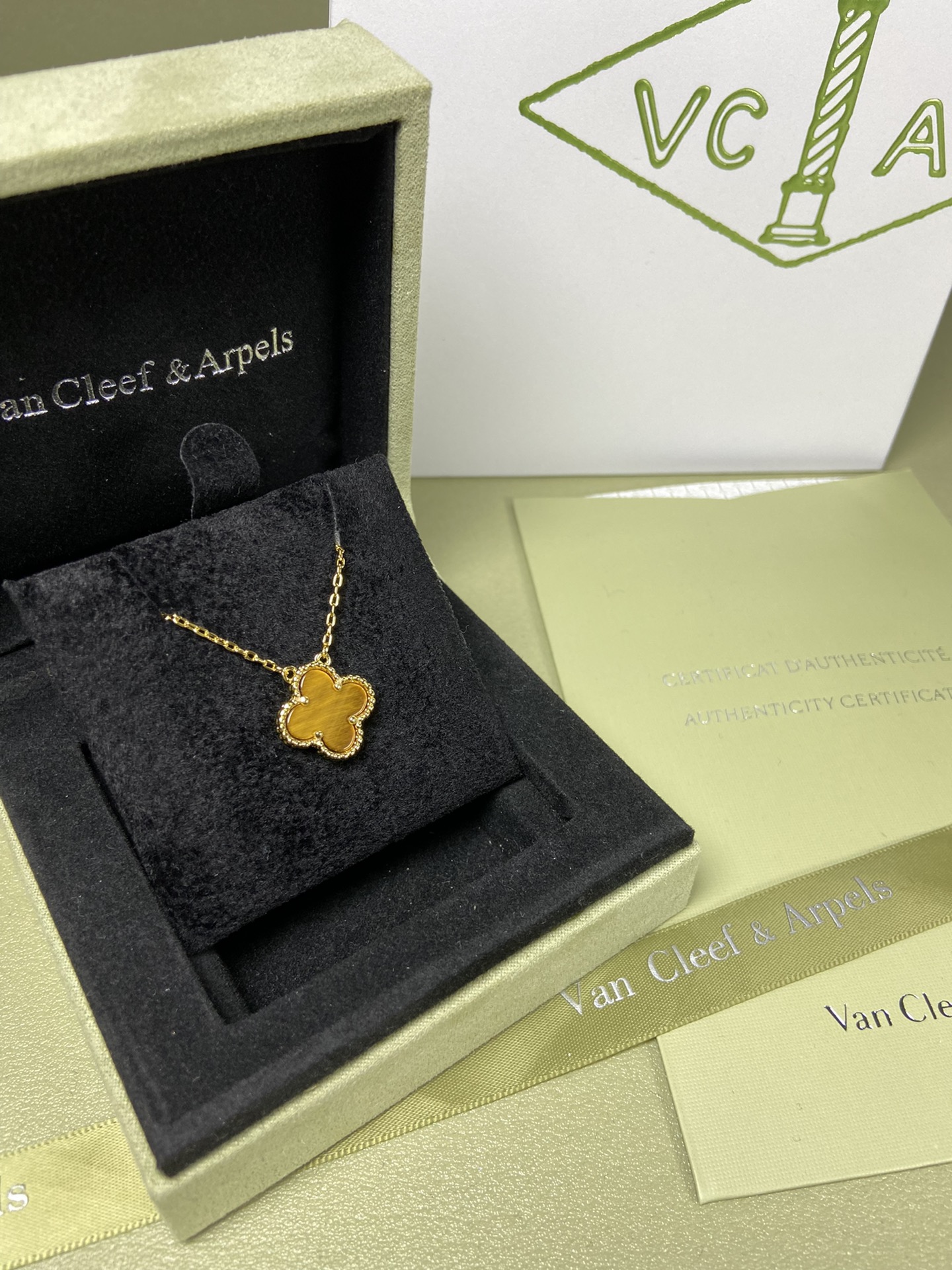 Van Cleef & Arpels tiger's eye four-leaf clover necklace