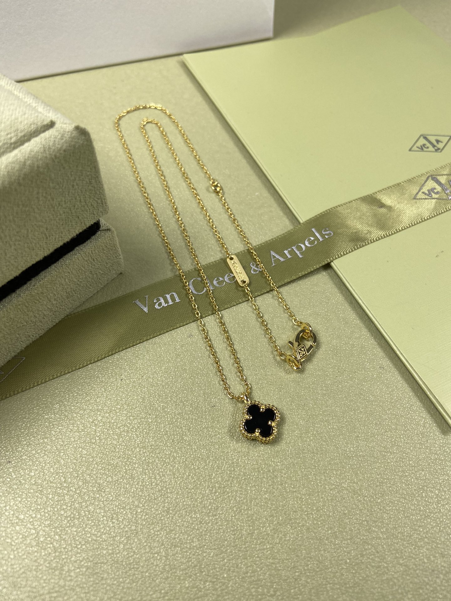 Van Cleef & Arpels mini black onyx four-leaf clover necklace
