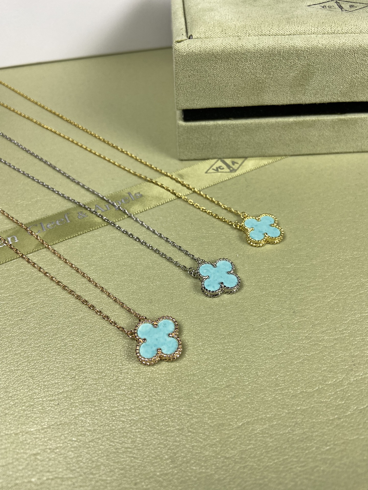 Van Cleef & Arpels mint blue four-leaf clover necklace
