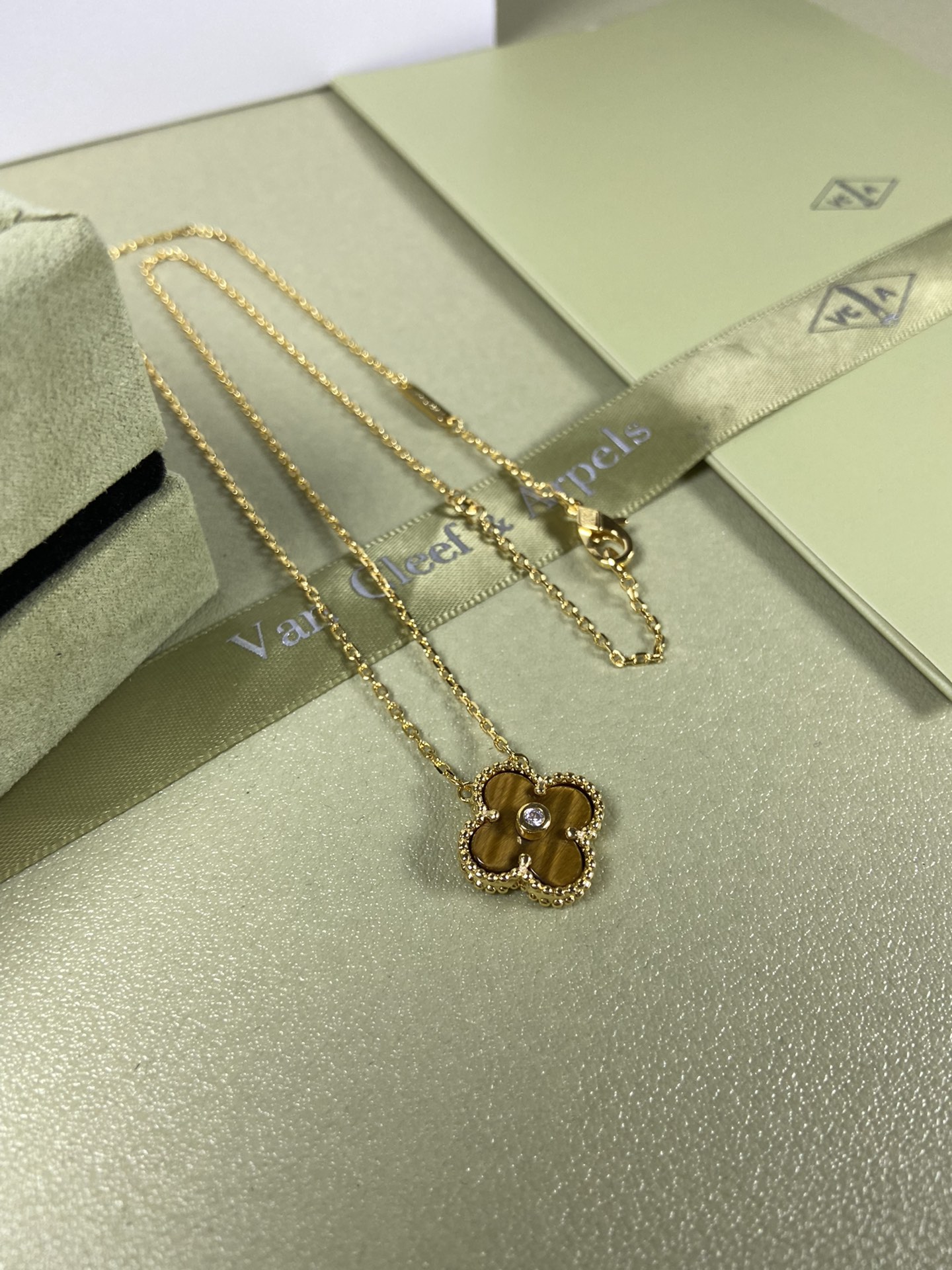 Van Cleef & Arpels tiger's eye four-leaf clover necklace