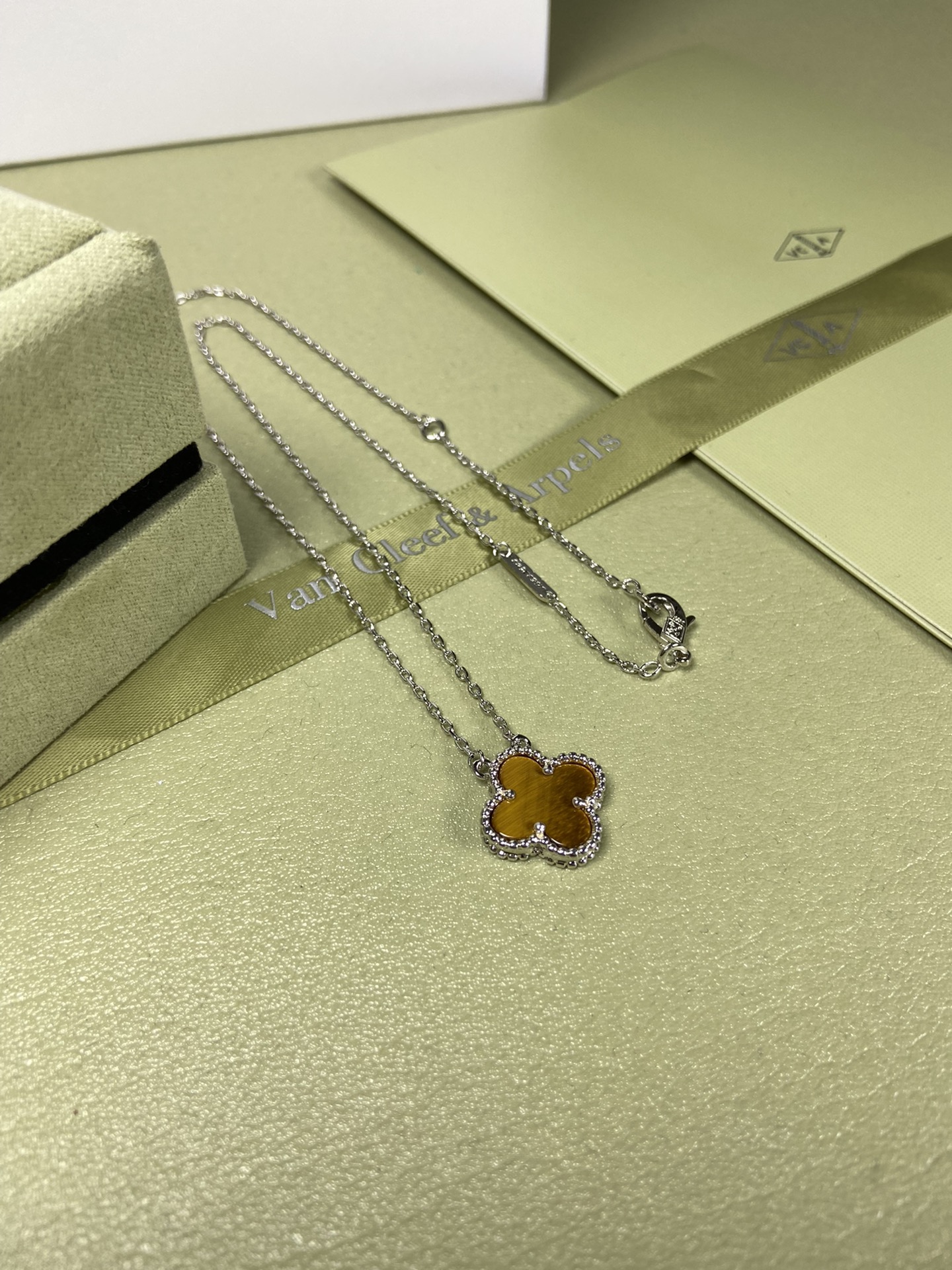 Van Cleef & Arpels tiger's eye four-leaf clover necklace