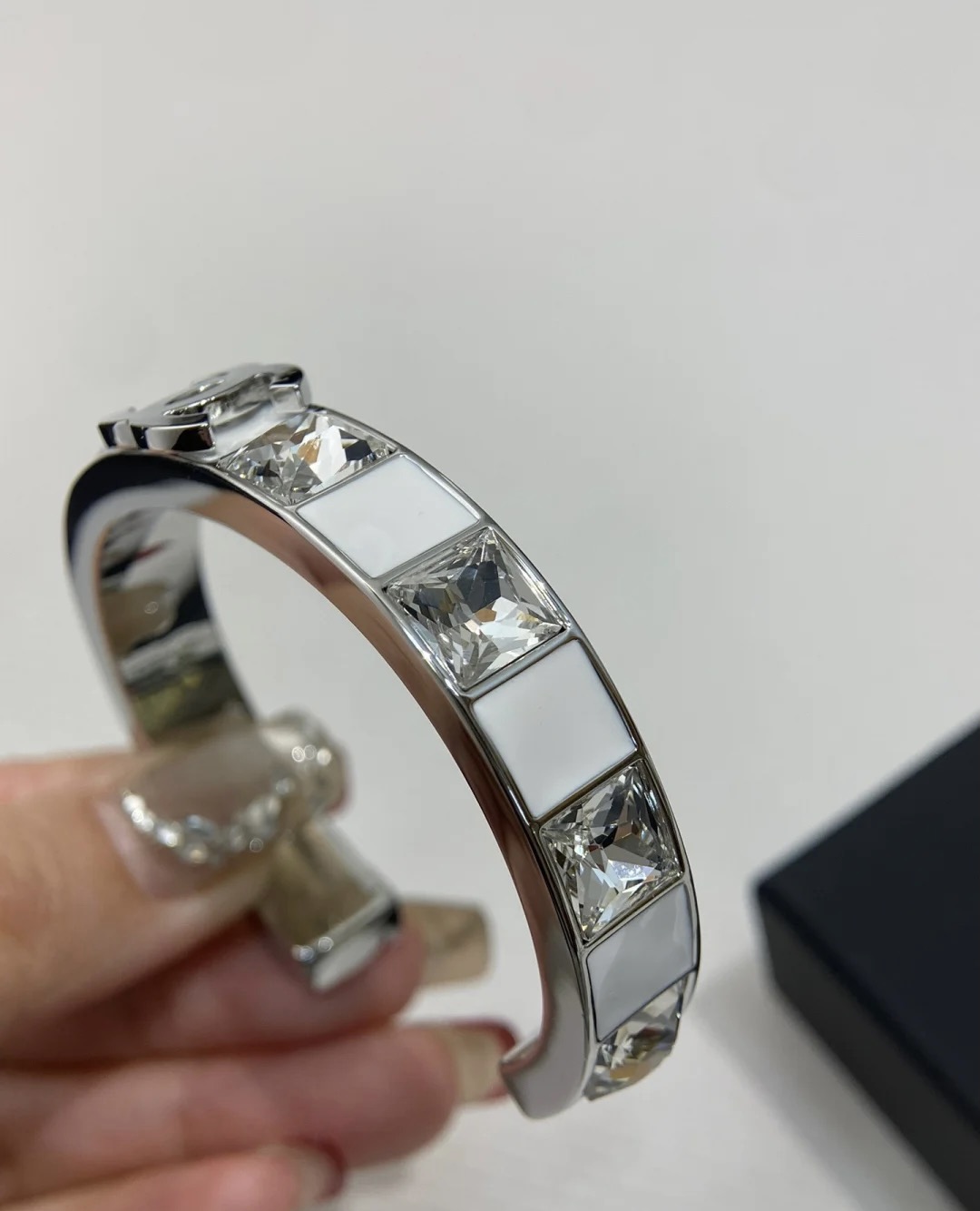 Chanel's new white enamel silver diamond cuff bracelet