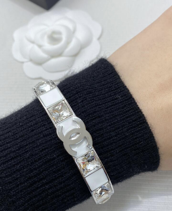 Chanel's new white enamel silver diamond cuff bracelet