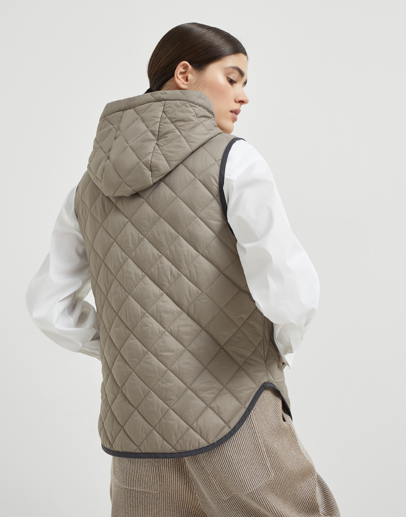 Lightweight matte nylon quilted vest with Thermore® padding and hood