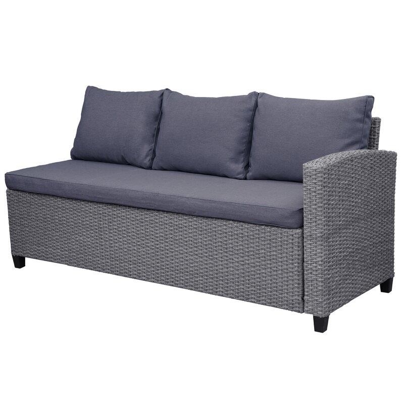 Julianna Wicker/Rattan 7 - Person Seating Group with Cushions