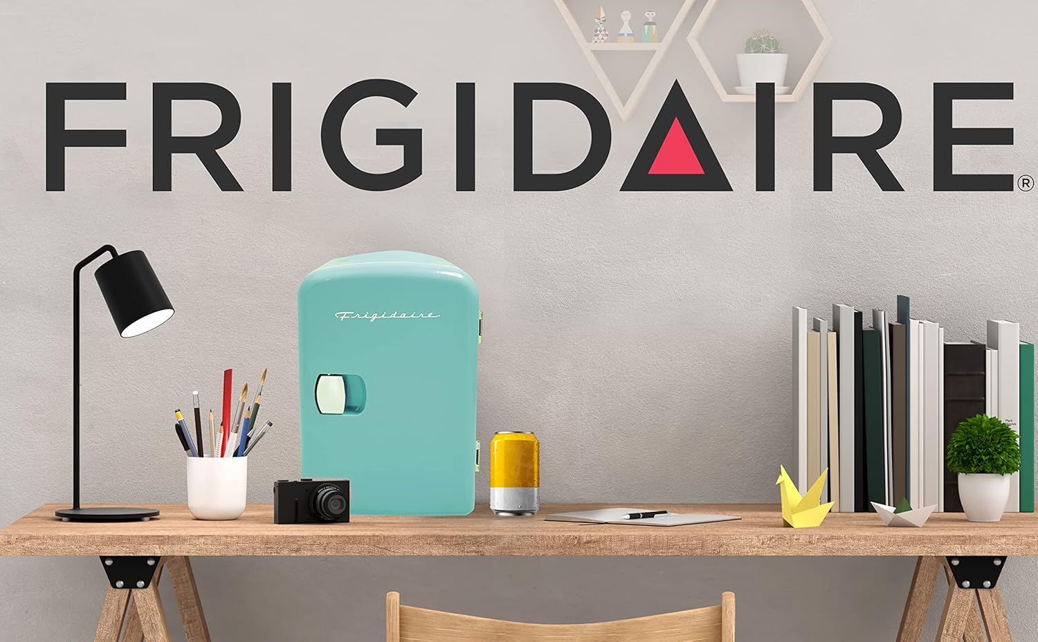 Frigidaire Mini Portable Compact Personal Fridge Cooler, 4 Liter Capacity Chills Six 12 oz Cans, 100% Freon-Free & Eco Friendly, Includes Plugs for Home Outlet & 12V Car Charger – Black