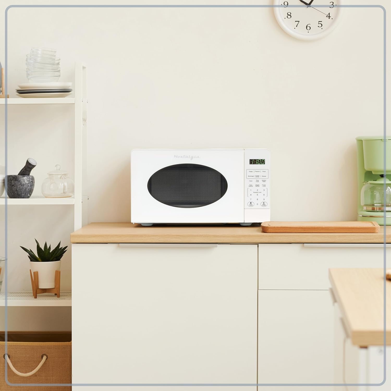 Nostalgia Retro Compact Countertop Microwave Oven - 0.7 Cu. Ft. - 700-Watts with LED Digital Display - Child Lock - Easy Clean Interior - Aqua