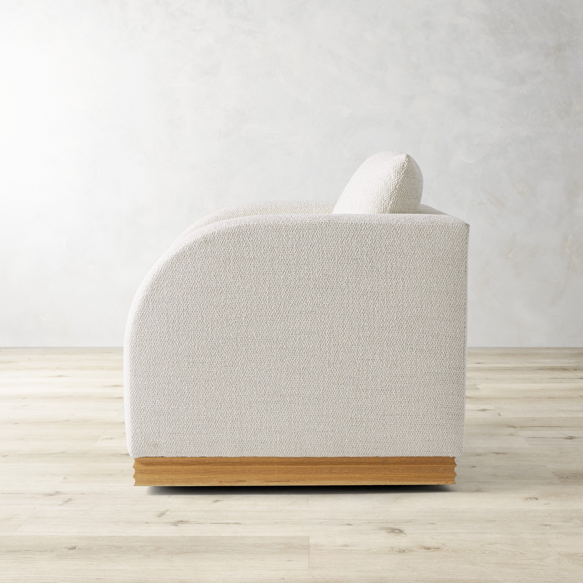 Fluted Base Swivel Armchair