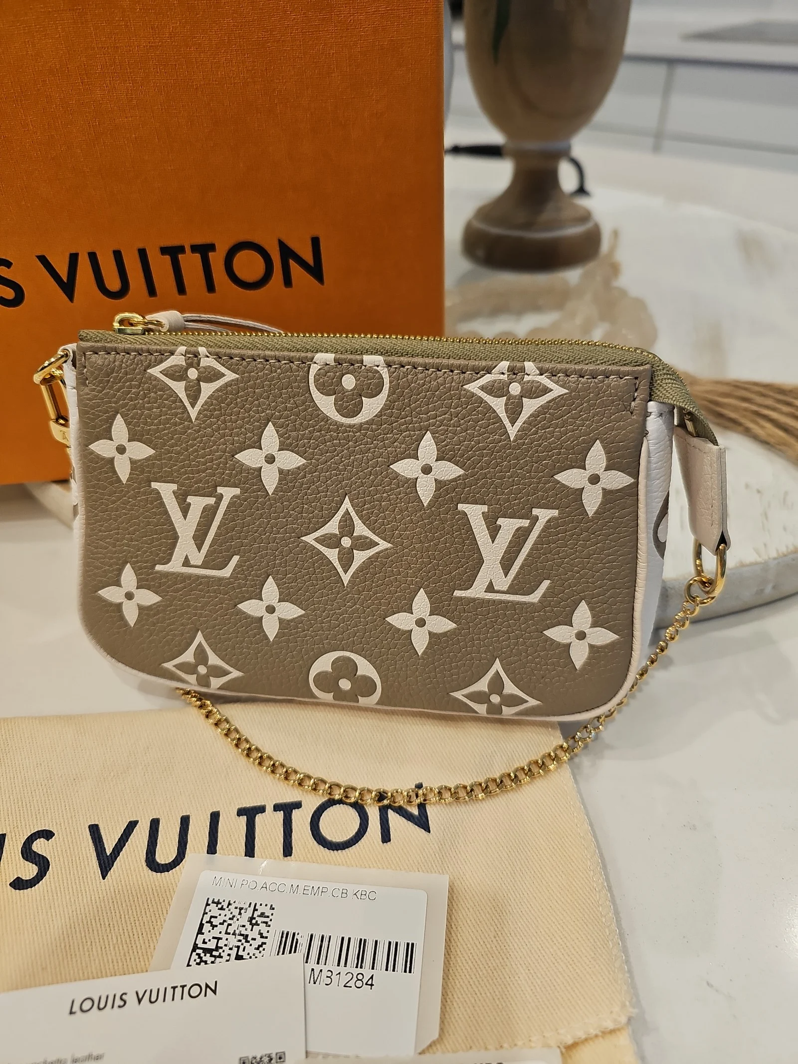 Louis Vuitton Empreinte Spring in the City Mini Pouchette Kaki khaki Beige Cream