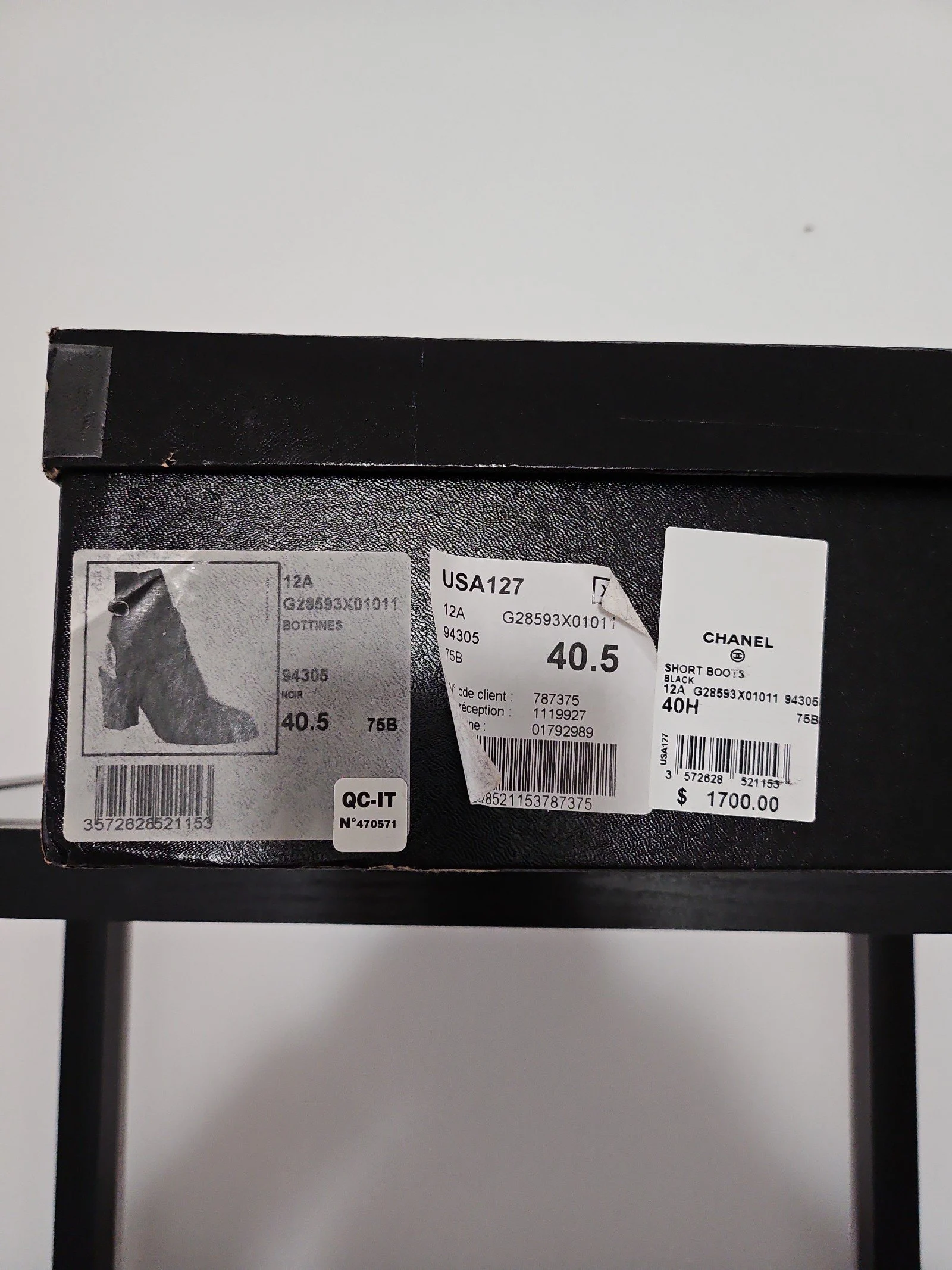 Chanel metal plaque runway boots