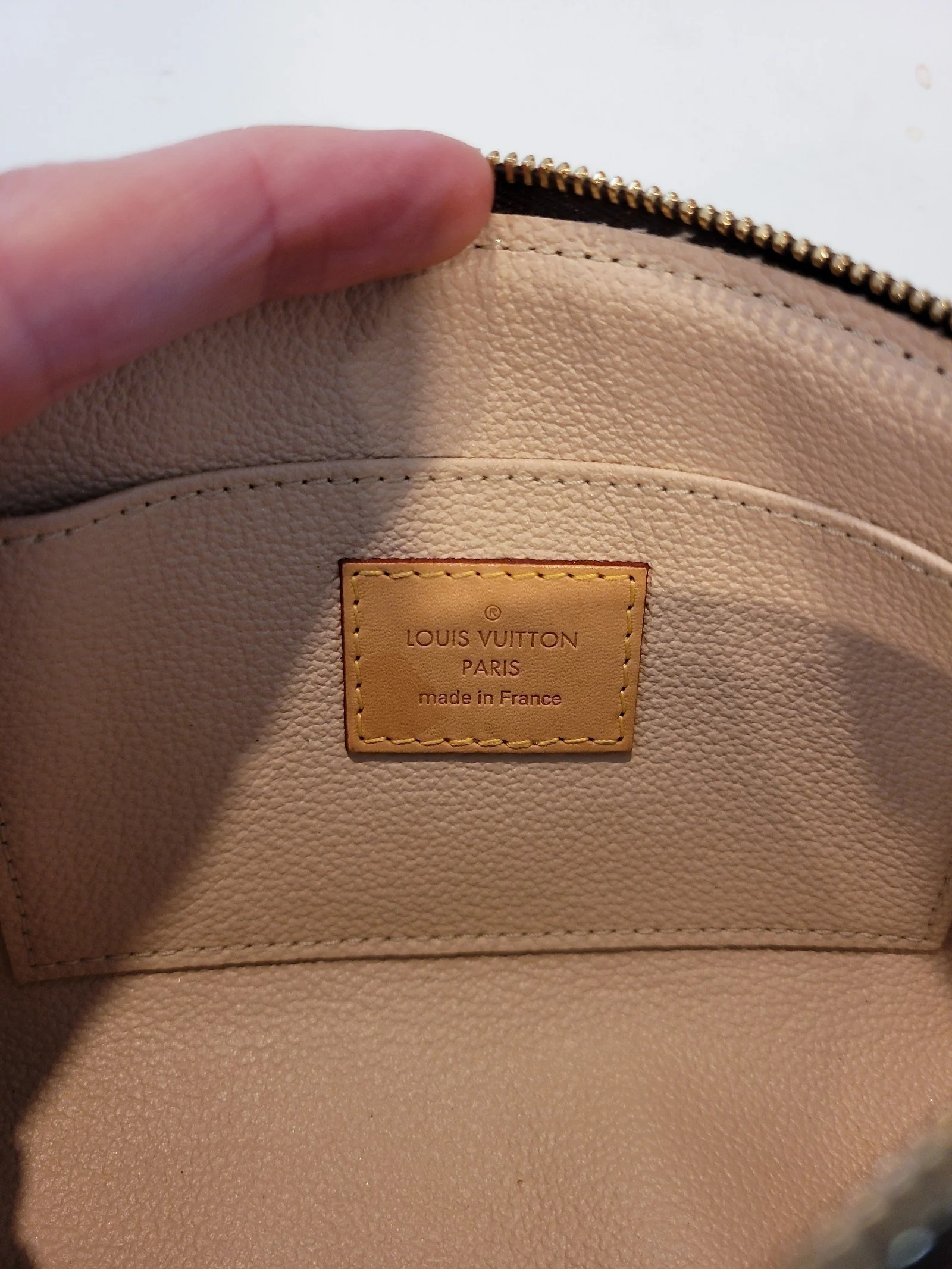 Louis Vuitton authentic cosmetic pouch FIRM