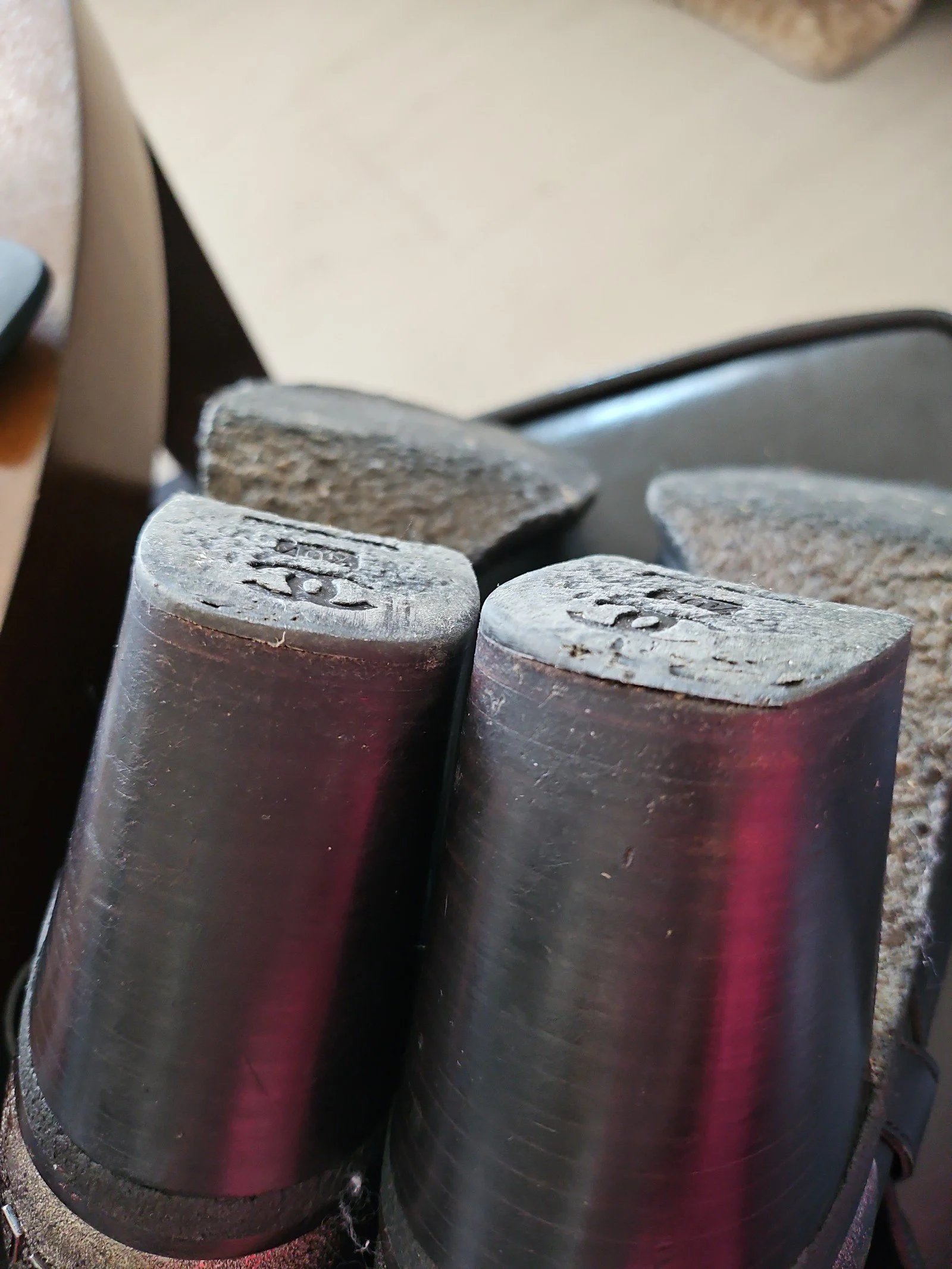 Chanel metal plaque runway boots