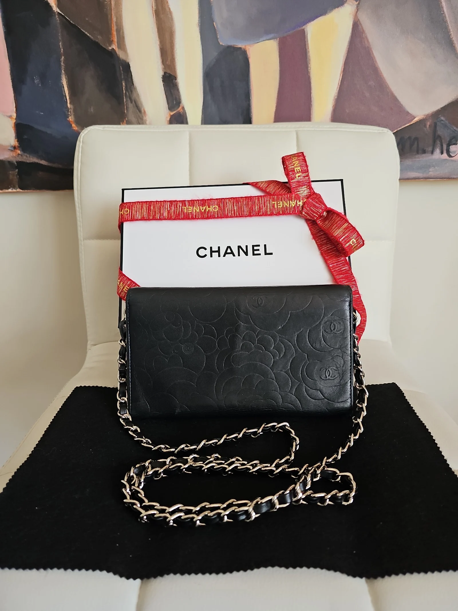 CHANEL Black Lambskin Camellia Embossed Wallet
