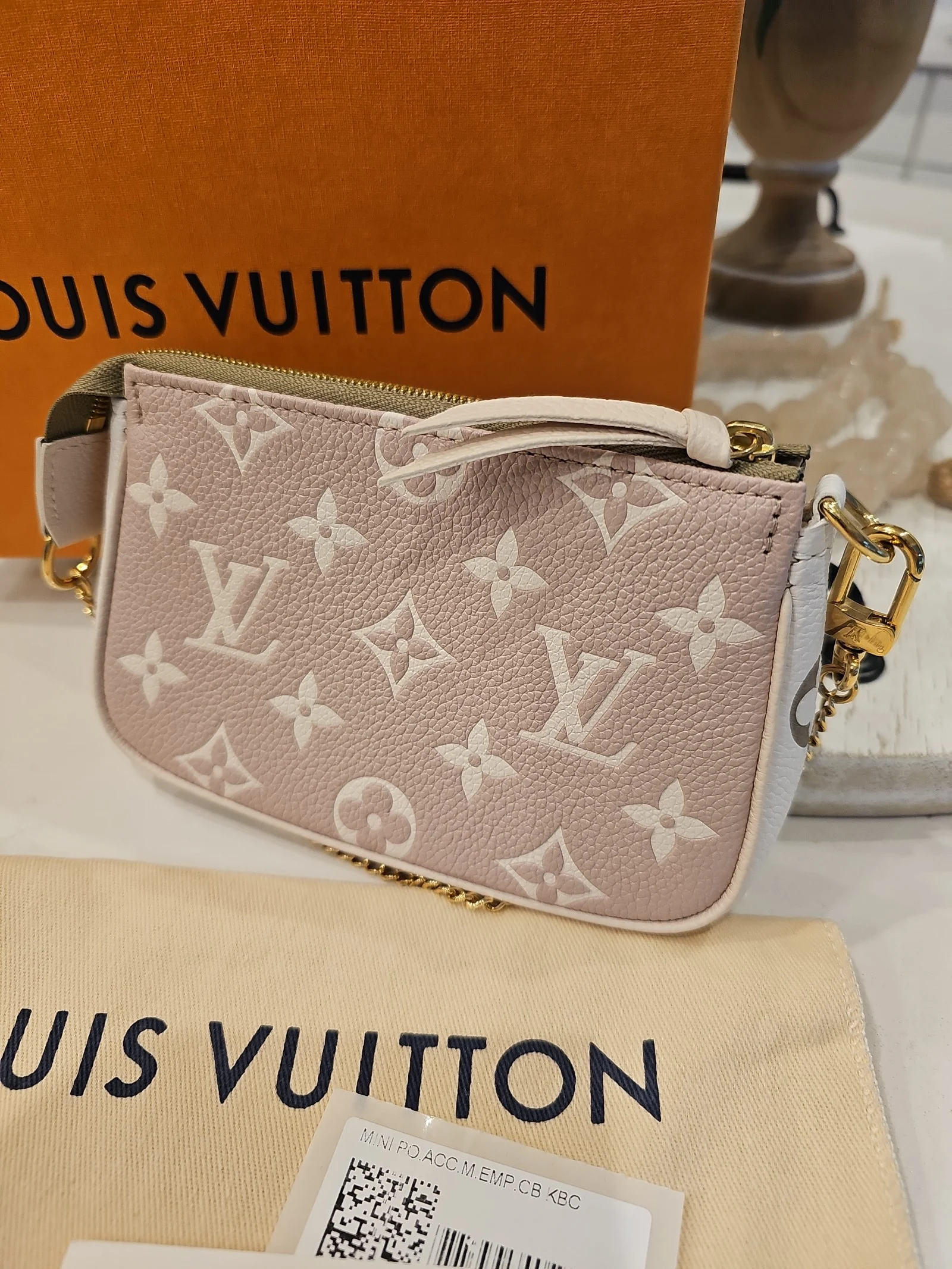 Louis Vuitton Empreinte Spring in the City Mini Pouchette Kaki khaki Beige Cream