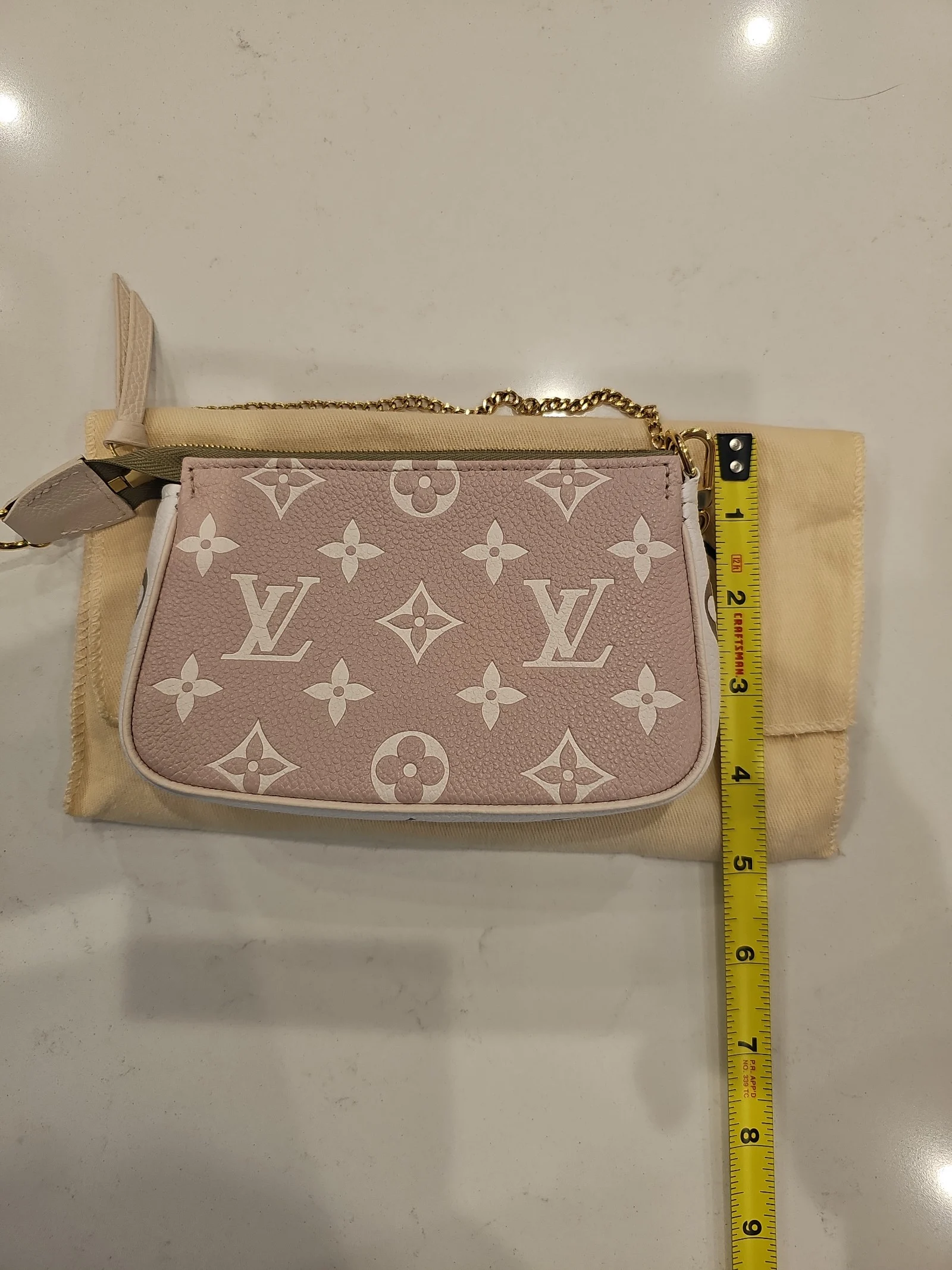 Louis Vuitton Empreinte Spring in the City Mini Pouchette Kaki khaki Beige Cream
