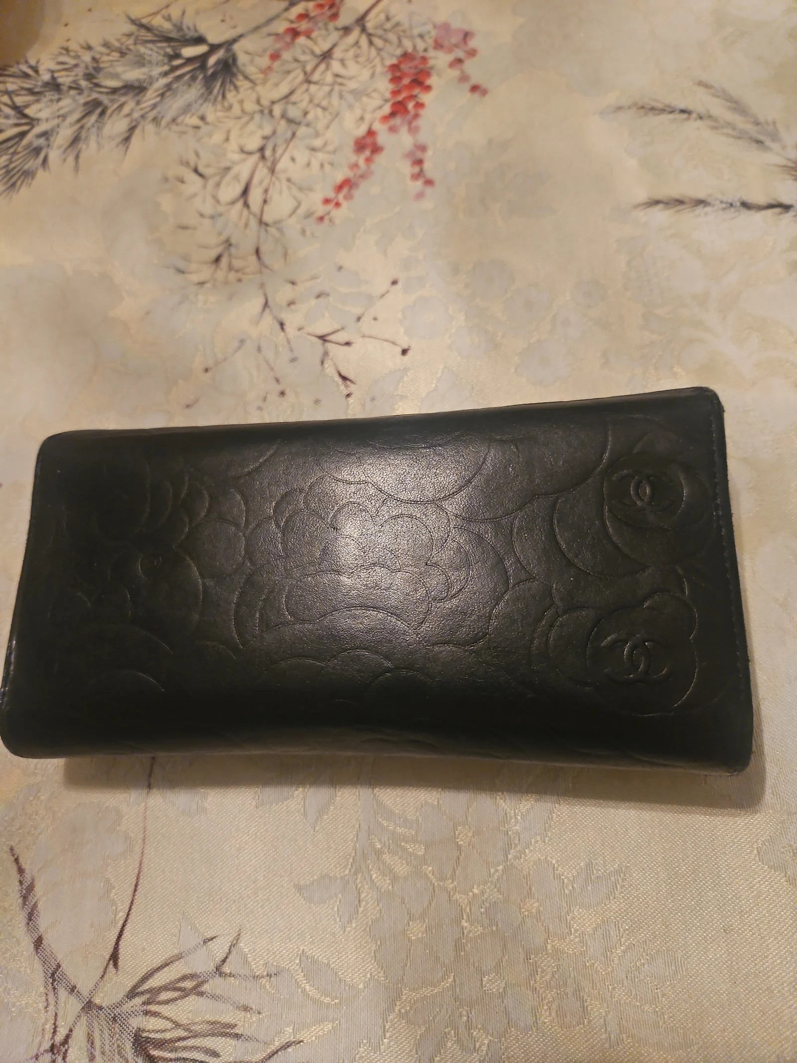 CHANEL Black Lambskin Camellia Embossed Wallet