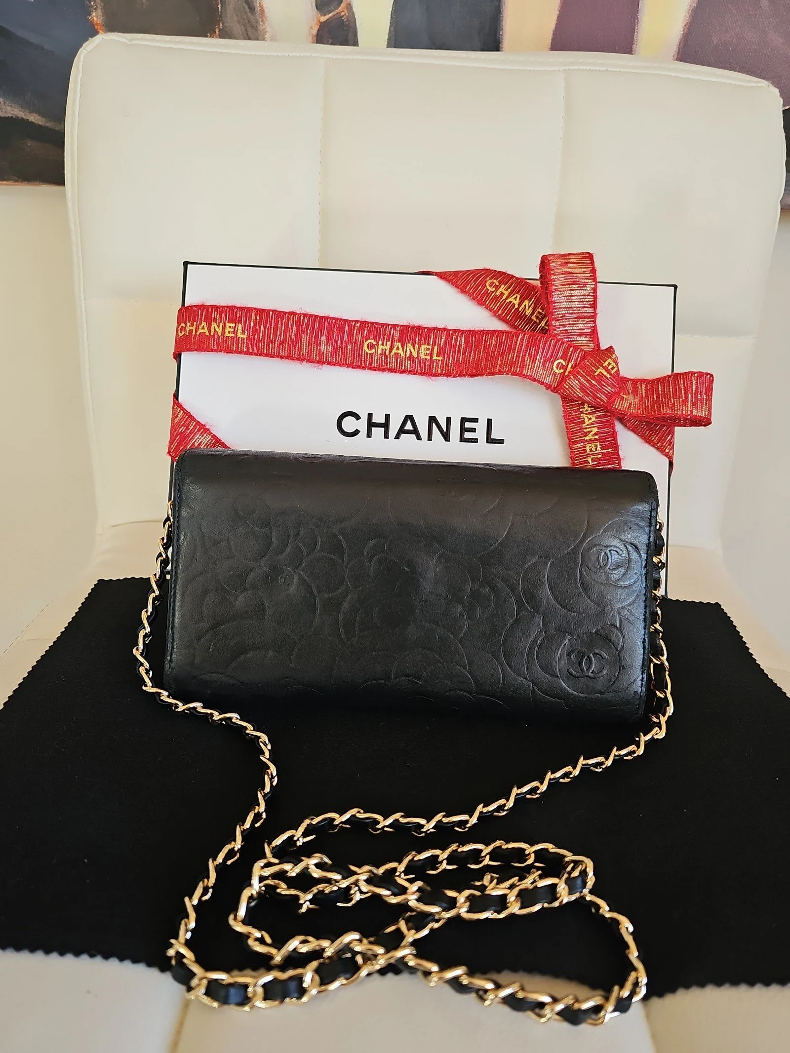 CHANEL Black Lambskin Camellia Embossed Wallet