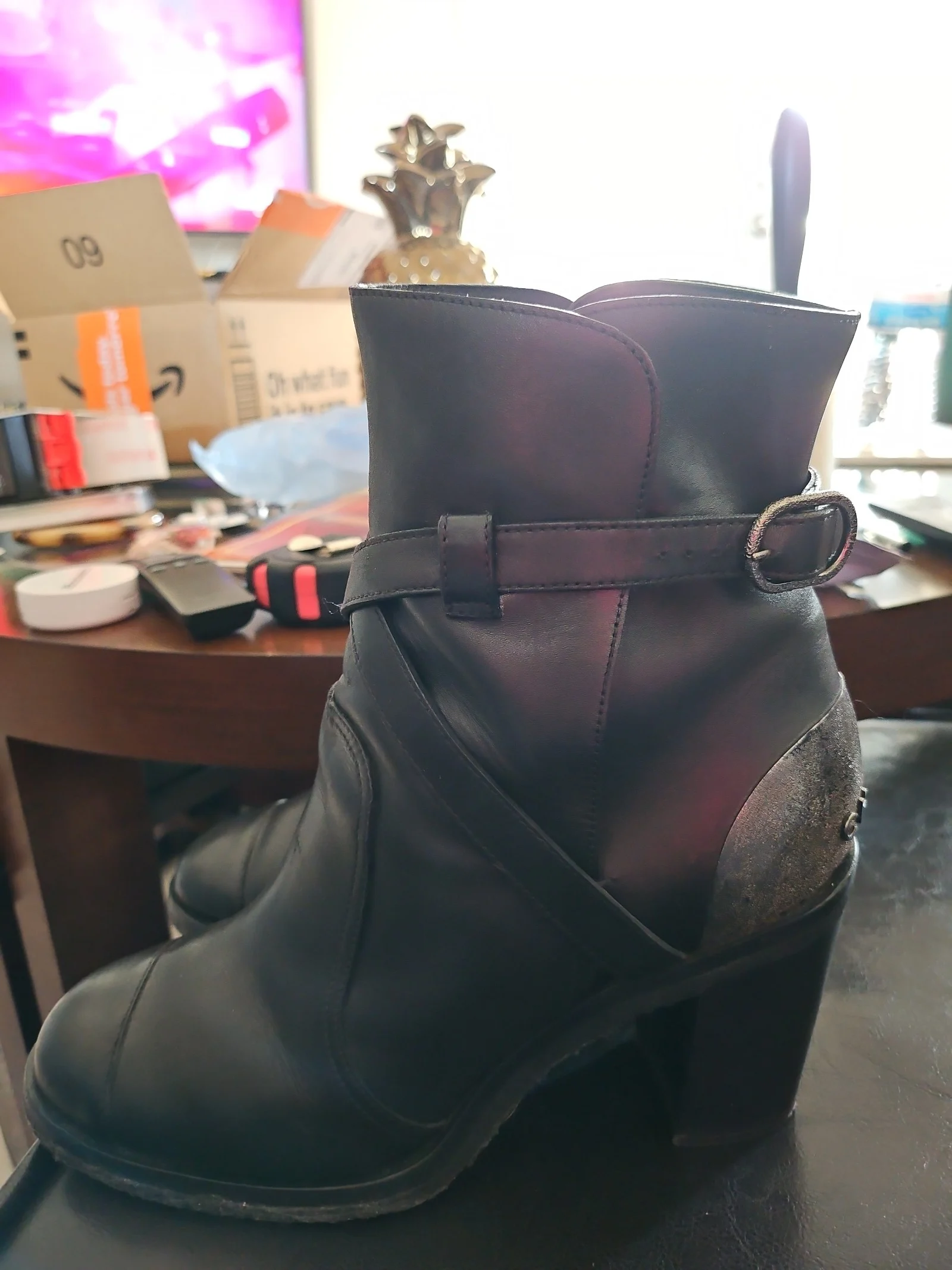 Chanel metal plaque runway boots