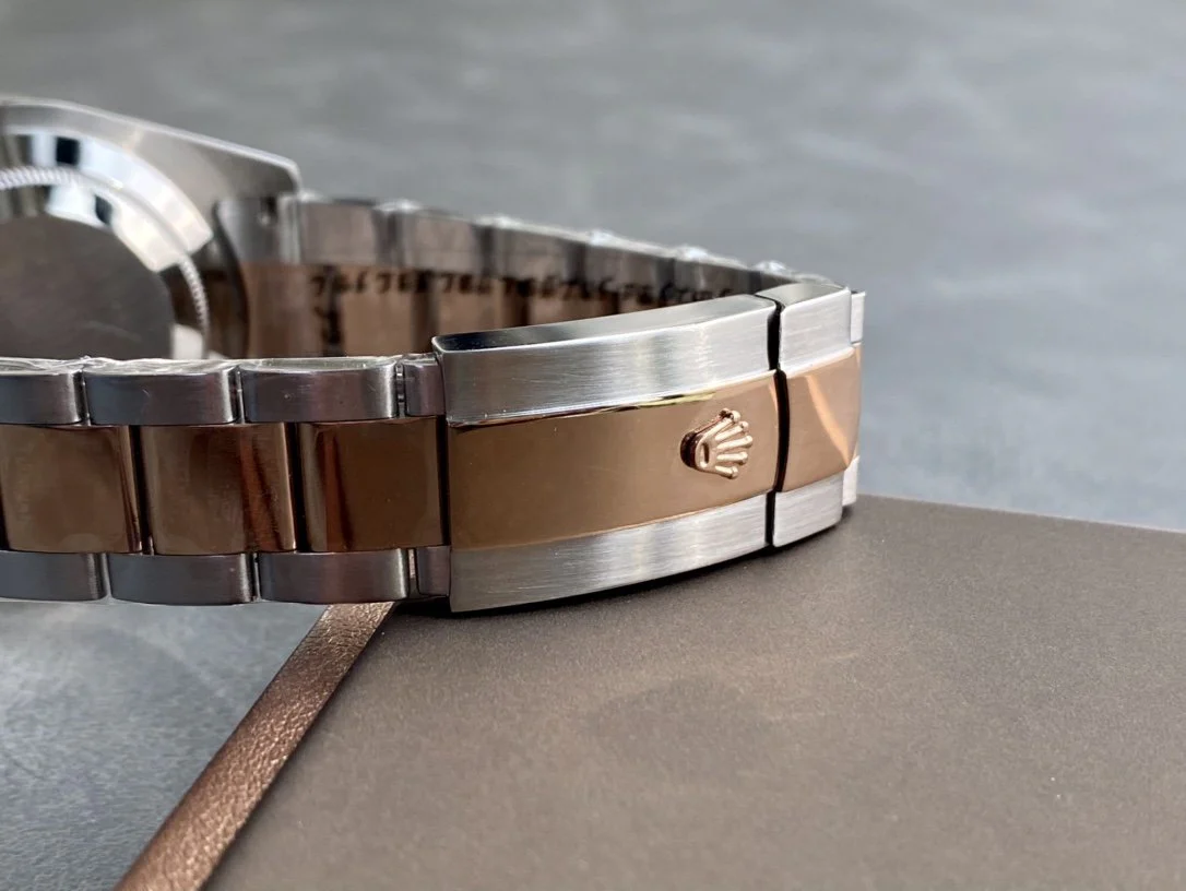 DATEJUST II GOLD STEEL WHITE DIAL ARABIC NUMERALS OYSTER BRACELET