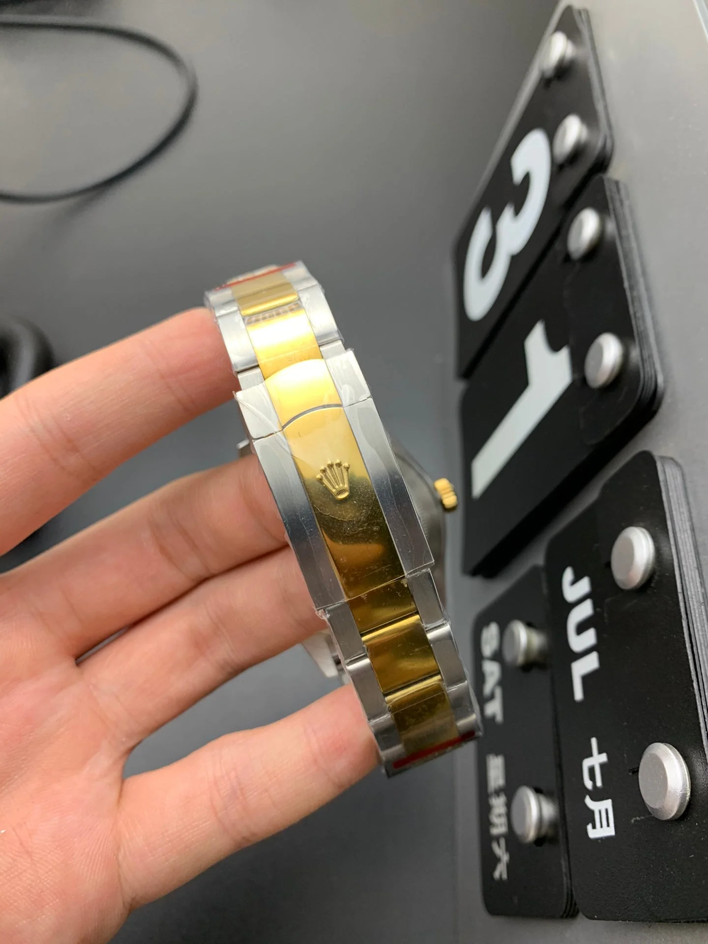 SKY DWELLER GOLD STEEL BLACK DIAL