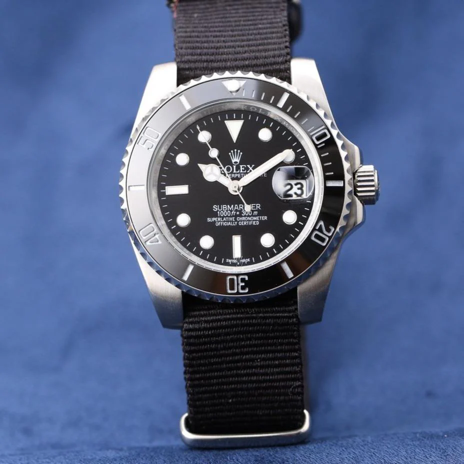 SUBMARINER DATE 40 CERAMIC BEZEL TEXTILE