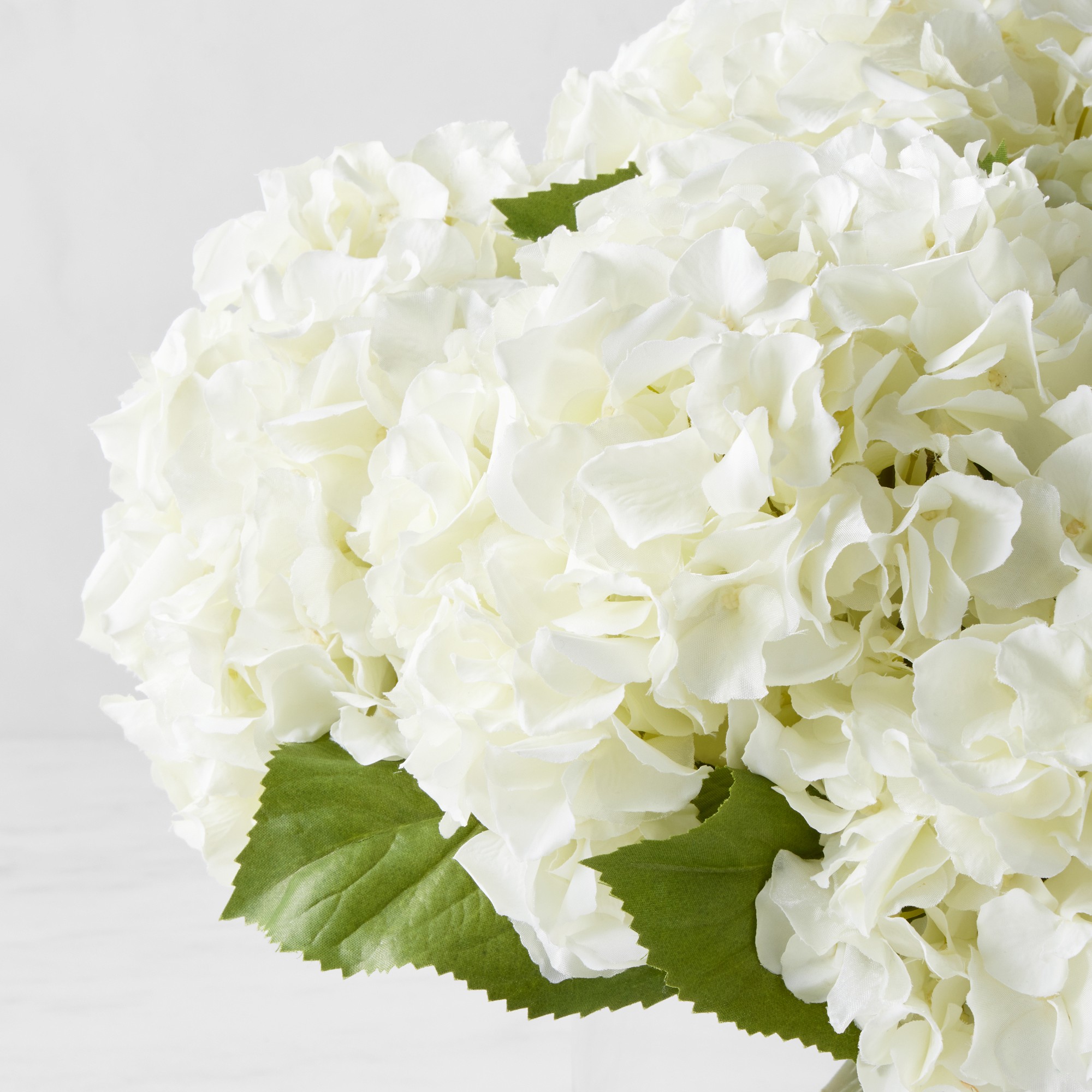 Faux White Hydrangea in Glass Vase