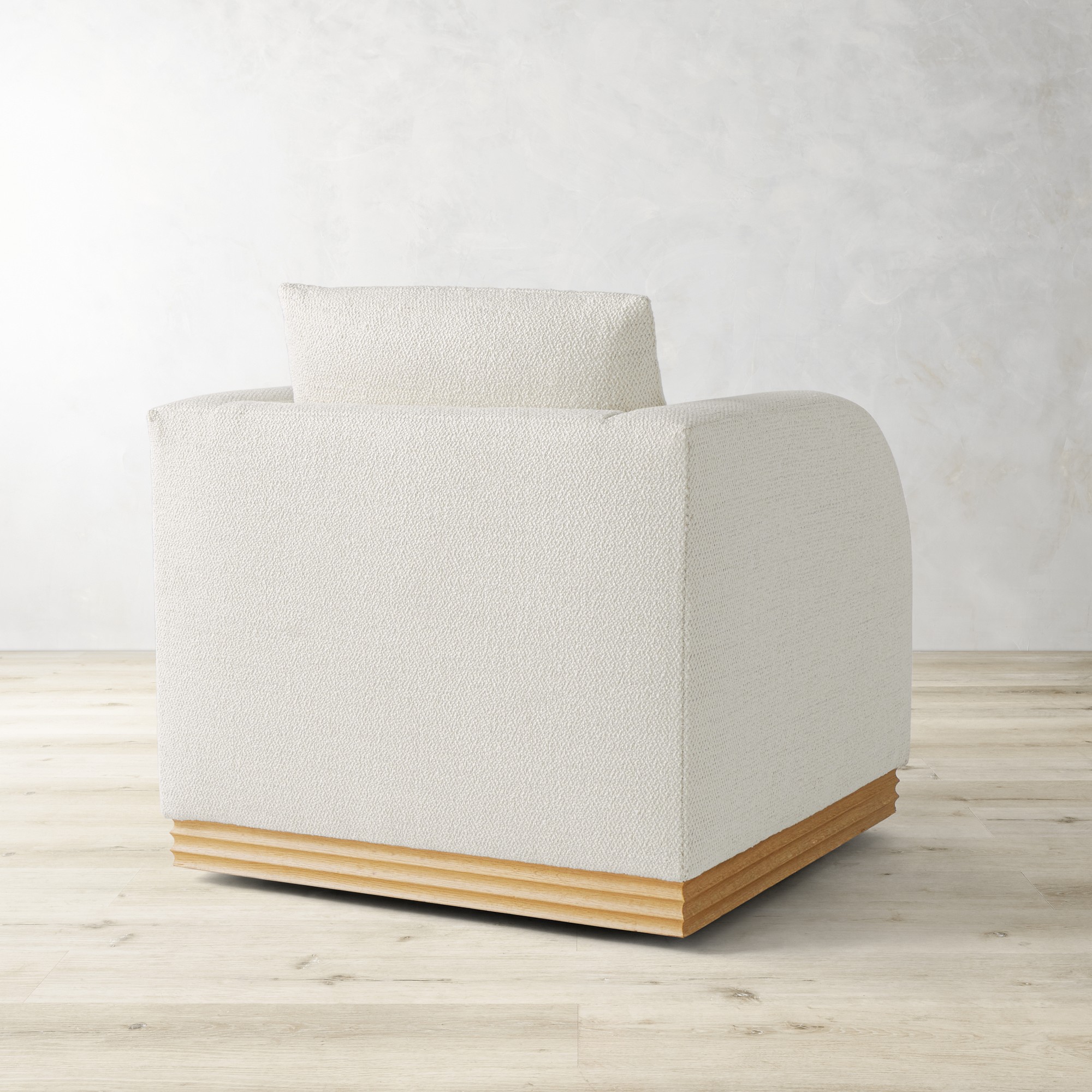 Fluted Base Swivel Armchair