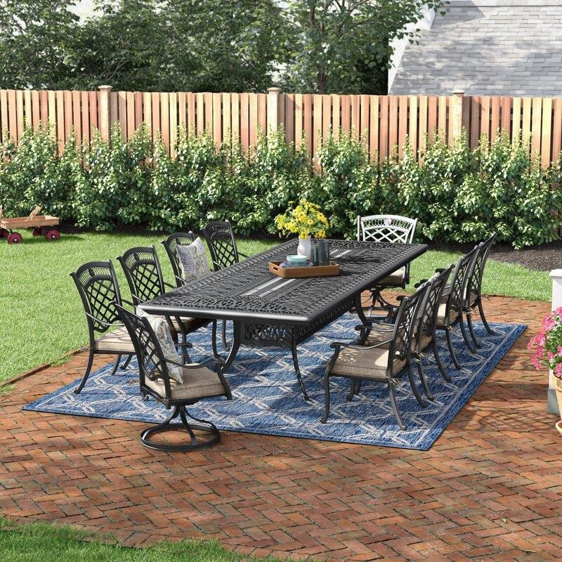 Wildermuth Rectangular 12 – Person 84&” Long Dining Set with Cushions