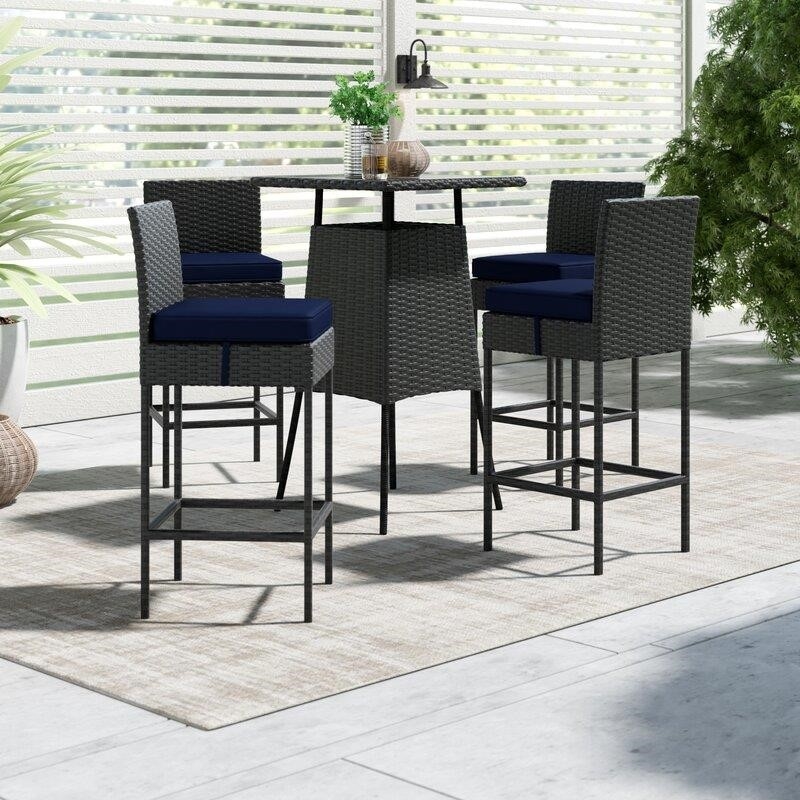 Tripp Square 4 – Person 31.5&” Long Bar Height Dining Set with Cushions