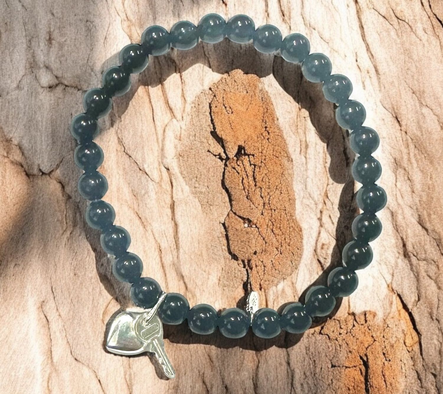 Alkeme Sterling Silver Onyx Charm Bracelet