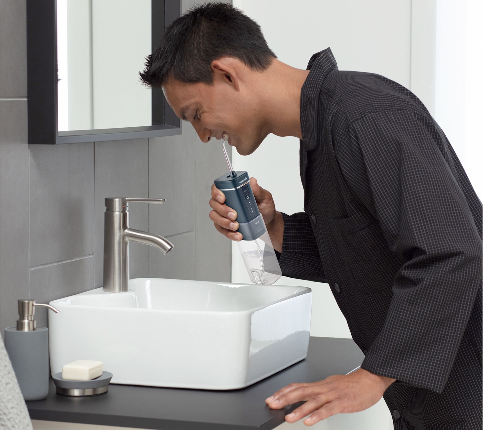 Waterpik Cordless Slide Water Flosser with 4 Precision Tips